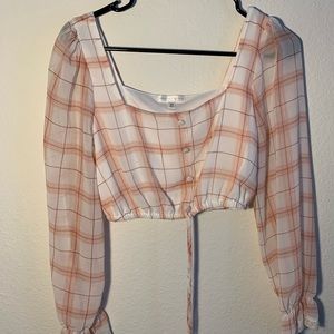 Very cute crop top, comes freshly washed